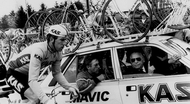 Sean Kelly rides alongside the KAS team car with Viscount Jean De Gribaldy in the front seat indicates Nr 1.